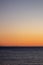 Airplane wake at sunset with the background of the mountains