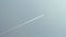 airplane white path on blue sky, abstract environment pollution, airliner flight,