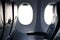 airplane window inside cabin. opening aircraft porthole