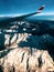 Airplane window view: airliner overflying the swiss-italian Alps