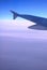 Airplane Wing Above Clouds