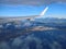 Airplane wing view over Downtown Seattle, Puget Sound, and Elliott Bay