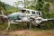 Airplane wreckage in jungle - old propeller aircraft in forest