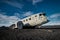Airplane wreckage Solheimasandur Iceland on black sand beach
