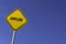 airplane - yellow sign with blue sky background