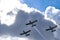 Airplanes on airshow. Aerobatic team performs flight at air show in Krakow, Poland.