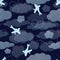 Airplanes flying from clouds on dark blue sky. Seamless pattern background