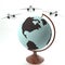 Airplanes over globe over white background