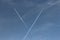 Airplanes trails in the sky, letter Y