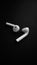 Airpods earphone wallpapers in black background. Wallpaper photos.