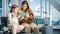 Airport Airplane Terminal: Cute Mother and Little Daughter Wait for their Vacation Flight, Play e-