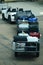 Airport, airside, passenger aircraft baggage handlers loading bags in the aircraft hold