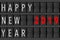 Airport Announcement Flip Mechanical Timetable with Hapy New 2019 Year Sign. 3d Rendering