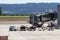 Airport baggage trailer waiting at the Santiago de Compostela airport