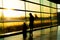 Airport, family waiting for their flight, silhouette of father with kids, Dublin Ireland