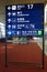 Airport gate sign, flight schedule, airline