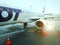 Airport, the plane on takeoff, landscape at sunset. Wing of plane close-up.