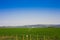 Airport runway and field with clear blue sky