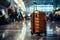 In the airport\\\'s hustle, a luggage bag fades into the blurred backdrop