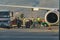 Airport staff uploading of luggage from aircraft in airport Bodrum