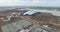 Airport and surrounding area. An aerial view of the airport hangers and surrounding area. High level aerial view of the