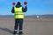 Airport worker directing