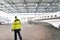 Airport workers check an aircraft for safety in a hangar