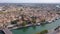Airscape of French town Agde with view of tiled rooftops and river Herault.