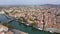 Airscape of French town Agde with view of tiled rooftops and river Herault.