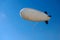 Airship Floating over Blue Sky