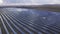 Airview of large field of solar panels producing clean, renewable energy, top view. Power plant with large number solar