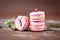 Airy and delicious tasteful rose and vanilla Macarons with buds of roses