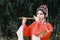 Aisa Chinese woman Peking Beijing Opera Costumes dress garden China traditional drama perform ancient Bamboo flute instruments