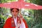 Aisa Chinese woman Peking Beijing Opera Costumes Pavilion garden China traditional role drama play bride hold red Umbrella