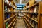 An aisle of wooden book shelves at the original University District  Amazon Bookstore