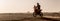 Ait Saoun, Morocco - February 22, 2016: Man riding dirt bike in the sand, spraying up a tail