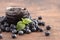 AJar of Homemade Blueberry Jam on a Rustic Wooden Table