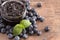 AJar of Homemade Blueberry Jam on a Rustic Wooden Table