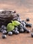 AJar of Homemade Blueberry Jam on a Rustic Wooden Table