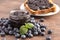 AJar of Homemade Blueberry Jam on a Rustic Wooden Table