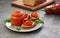 Ajvar pepper mousse in a jar and on a slices of bread