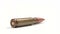 AK-47 ammunition 7,62x39mm,Defocus on a lying single bullet\'s bottom. From the back to the front. White background