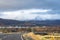 Akureyri biggest city of the North in Iceland in front of snow covered mountains in autumn