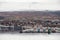 AKUREYRI, ICELAND - OCTOBER 19, 2014: Akureyri City Cityscape with Port, Gulf, Bay, and Snowy Mountain. Iceland