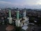 Al Barkah Mosque Largest Masjid in Bekasi, Ramadan Eid Concept background, Travel and tourism. with noise cloud after rain and