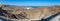 Al Bustan Palace near Old Town, Muscat in Oman looking down from mountains panning across the spectacular scene looking towards