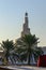 Al Fanar Mosque above Palm Trees