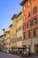 Al fresco dining at an outdoor restaurant in a gothic building in Florence Italy