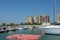 Al Hamra, Ras al Khaimah, United Arab Emirates Marina with boats and apartments and blue water and sky