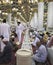 AL MADINAH, SAUDI ARABIA-CIRCA MAY 2019:  Unidentified Muslim men prepare to break fast at dawn inside Nabawi mosque in Medina,